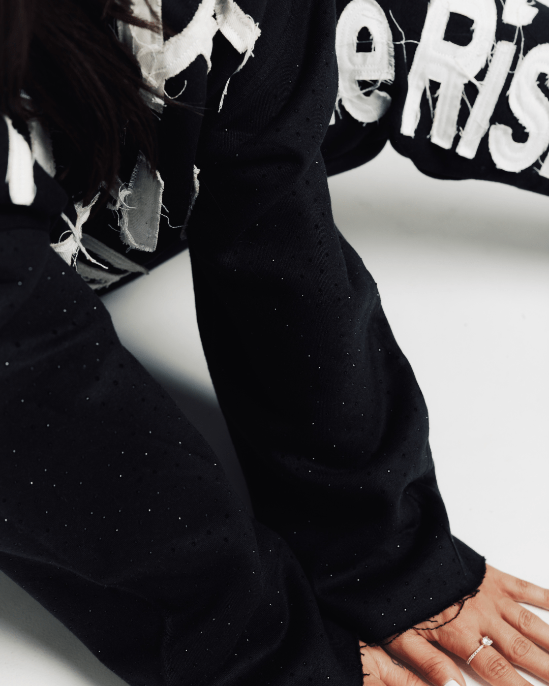 "Take The Risk" Fabric on Fabric Rhinestone Hoodie (Black)