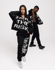 "Take The Risk" Fabric on Fabric Rhinestone Hoodie (Black)